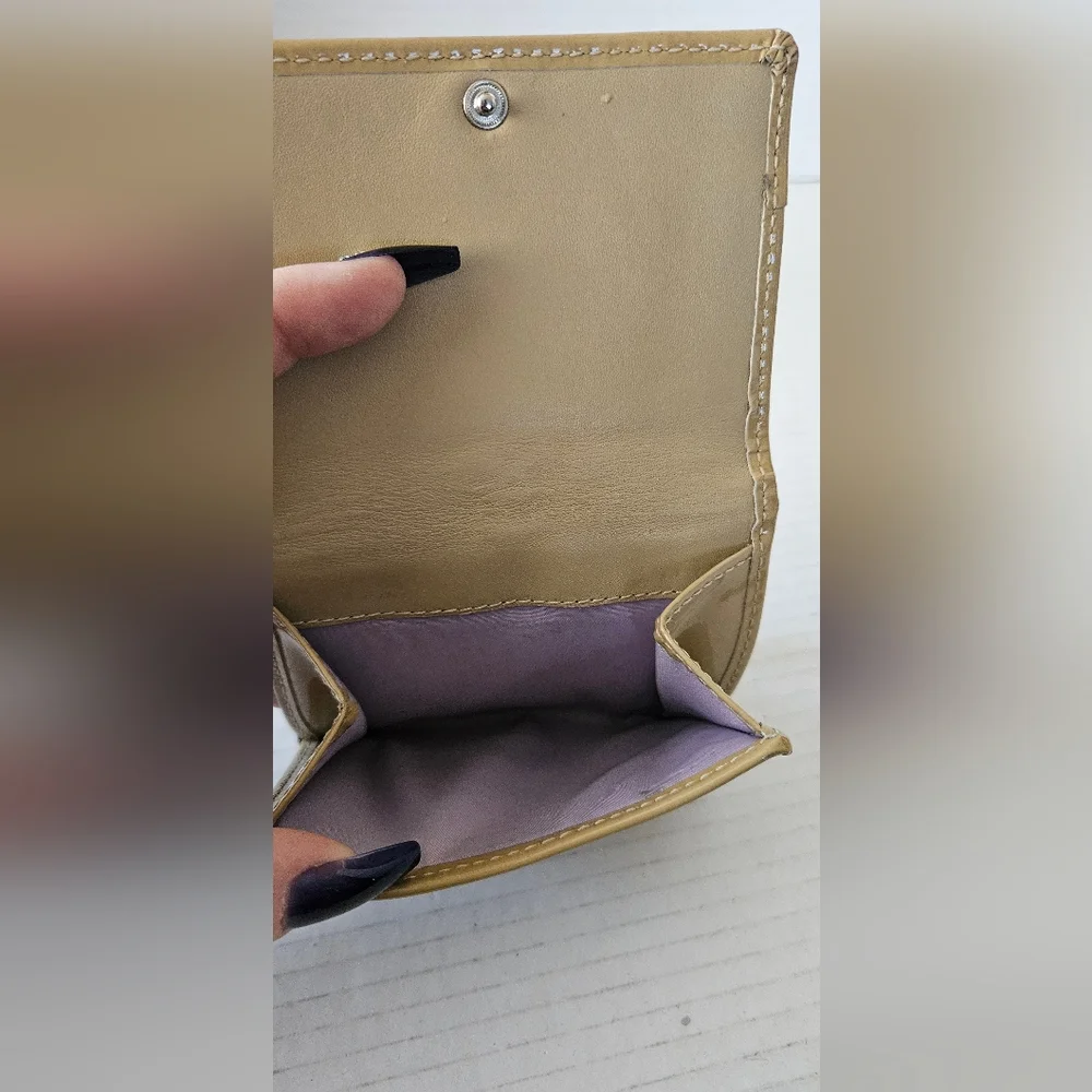 Coach Signature bi‎ fold wallet